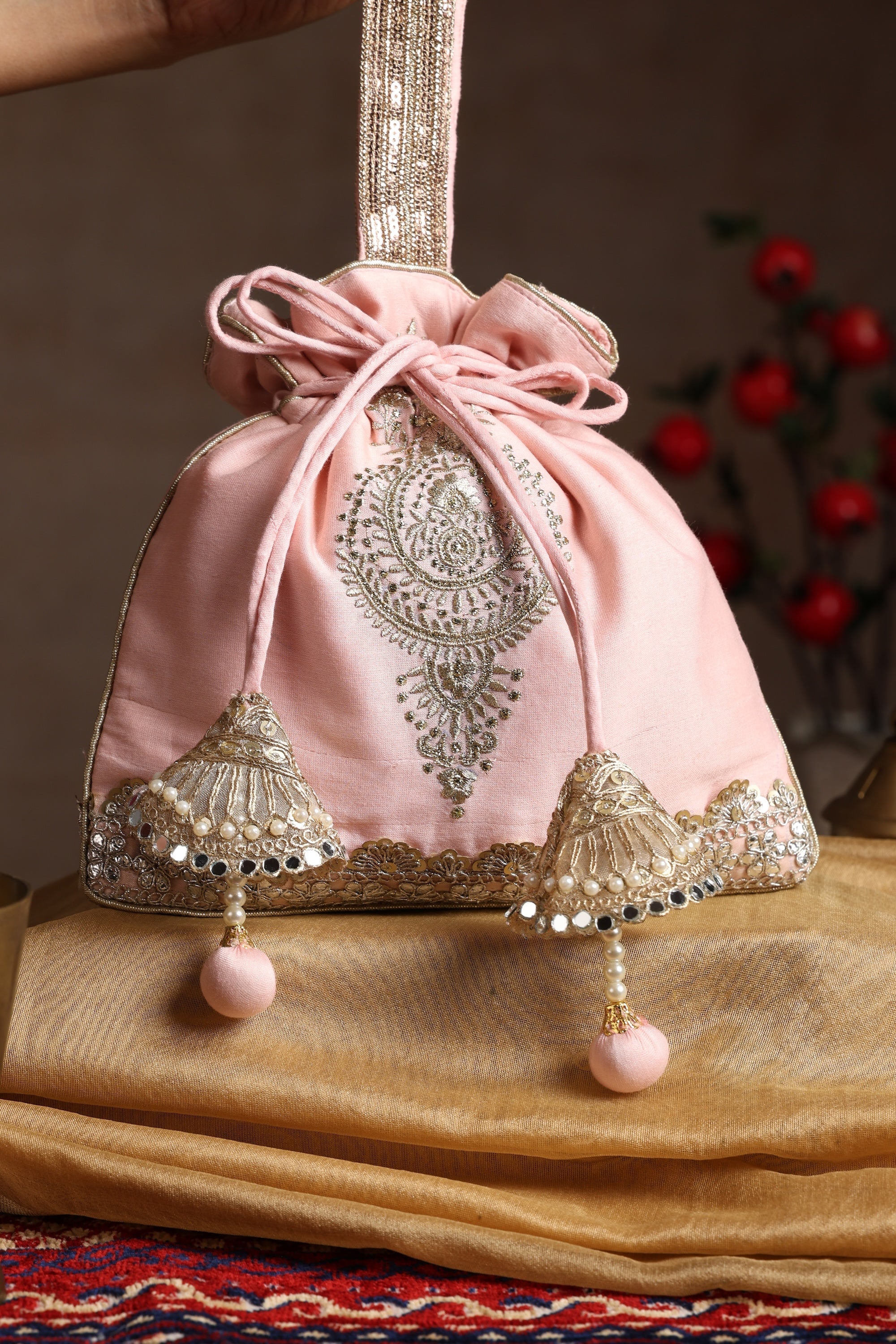 Sui Kala Inashi Peach Embroidered Potli Bag