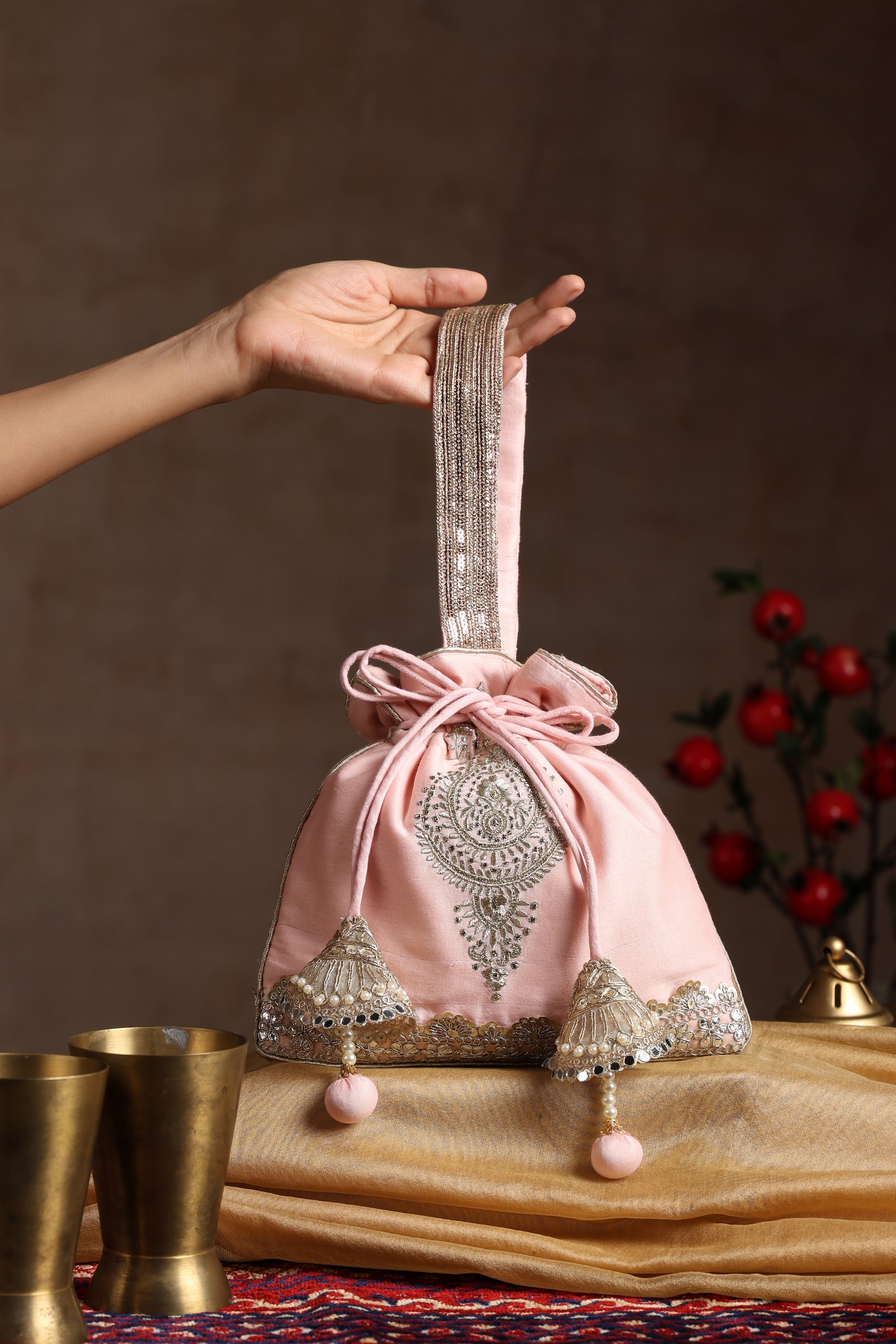 Sui Kala Inashi Peach Embroidered Potli Bag