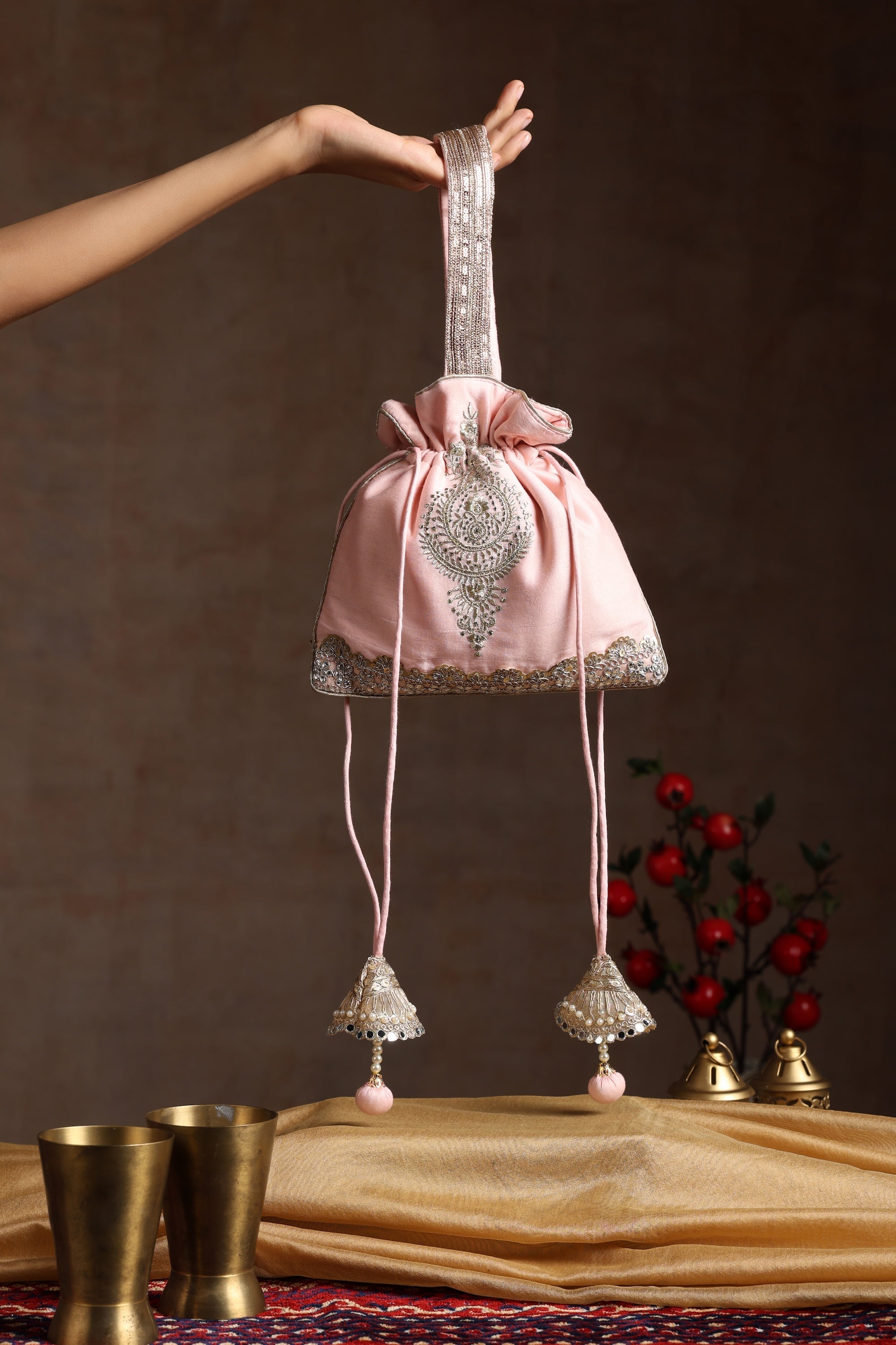 Sui Kala Inashi Peach Embroidered Potli Bag